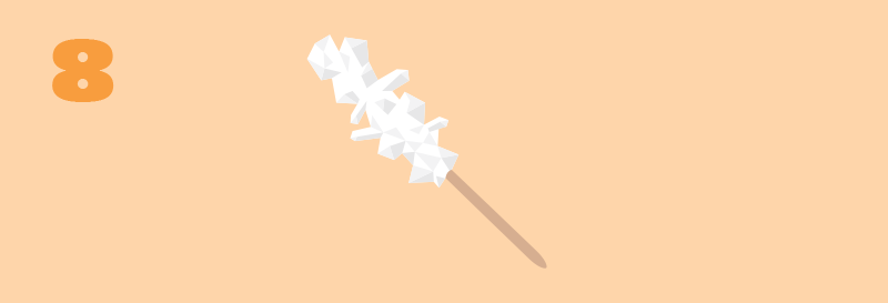 Illustrasjon av en ferdig pinne med sukkerkrystaller på