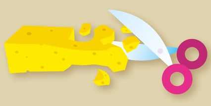 Illustrasjon av en saks som klipper i en svamp