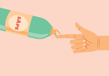 Finger som rører en såpeflaske