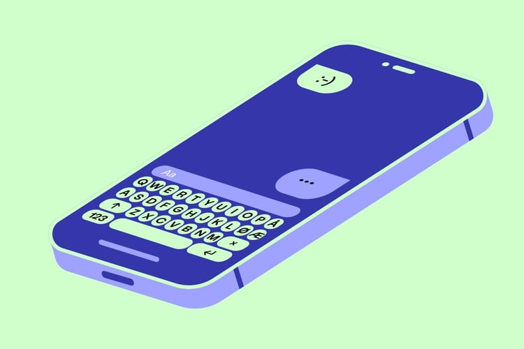 En mobilskjerm hvor eieren har mottatt et smilefjes, og holder på med å svare tilbake.