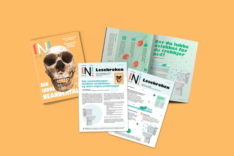 Nysgjerrigperblader mot oransje bakgrunn